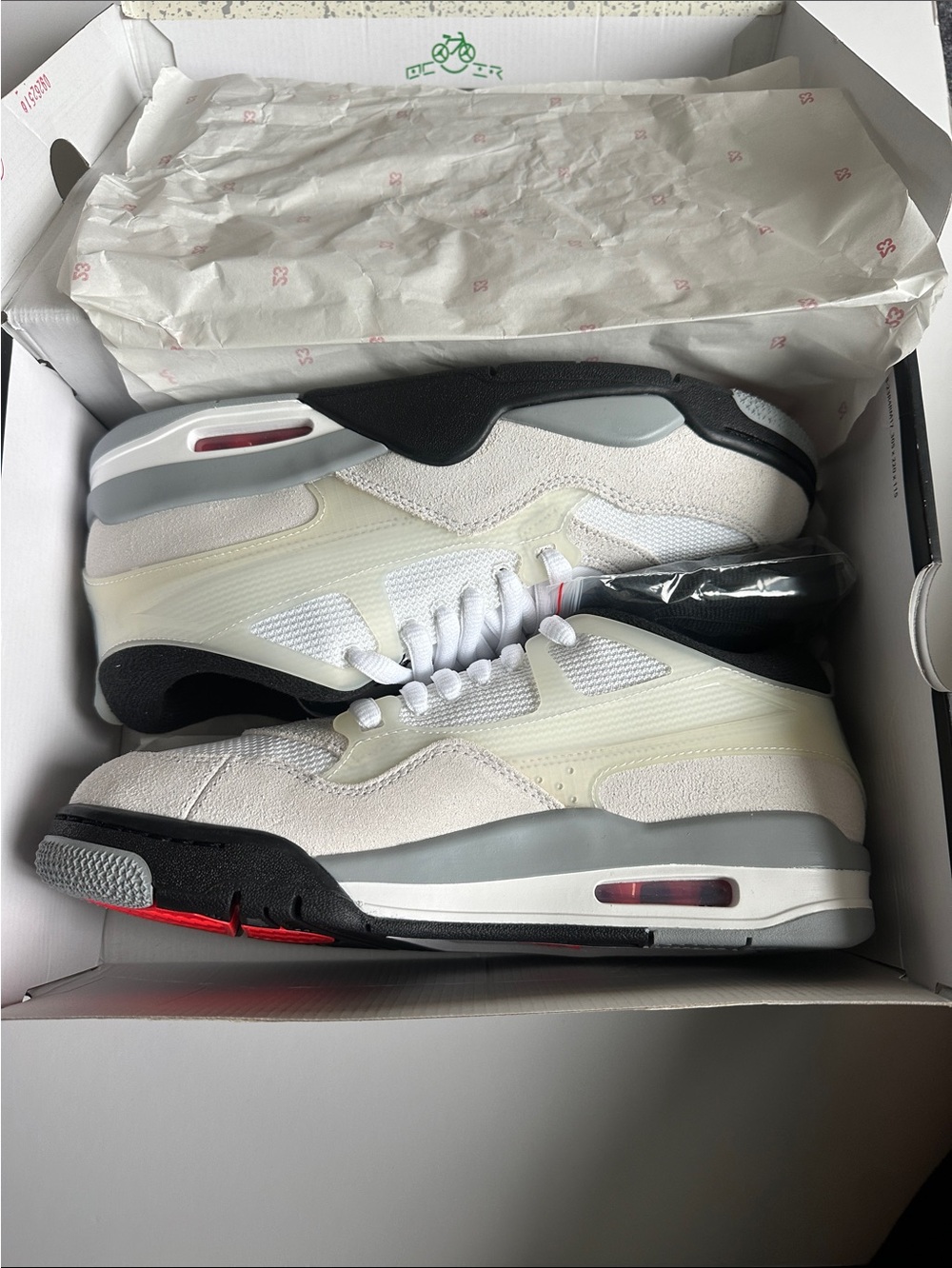 Air Jordan 4 RM White, Black, Grey and Red Low-Top Retro Sneakers